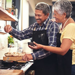 Shot of a happy senior couple cooking together at homehttp://195.154.178.81/DATA/i_collage/pi/shoots/805461.jpg